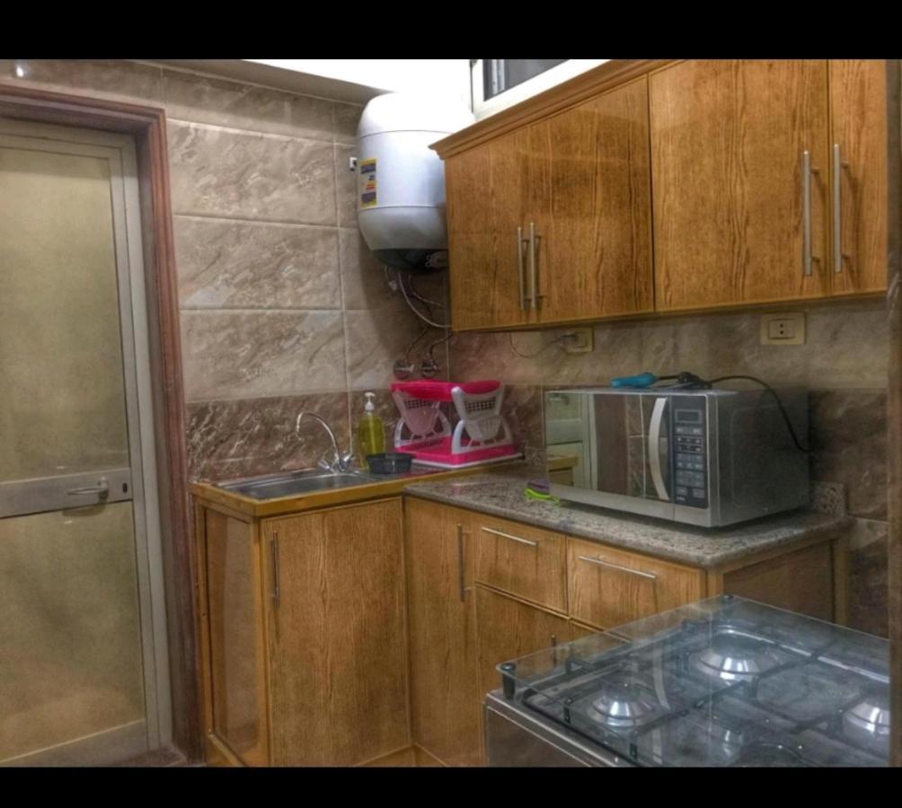 Hidden Gem With Pool Access In New Cairo Apartment Bagian luar foto