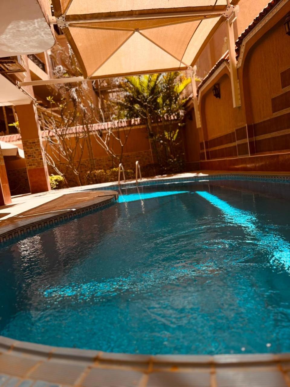 Hidden Gem With Pool Access In New Cairo Apartment Bagian luar foto